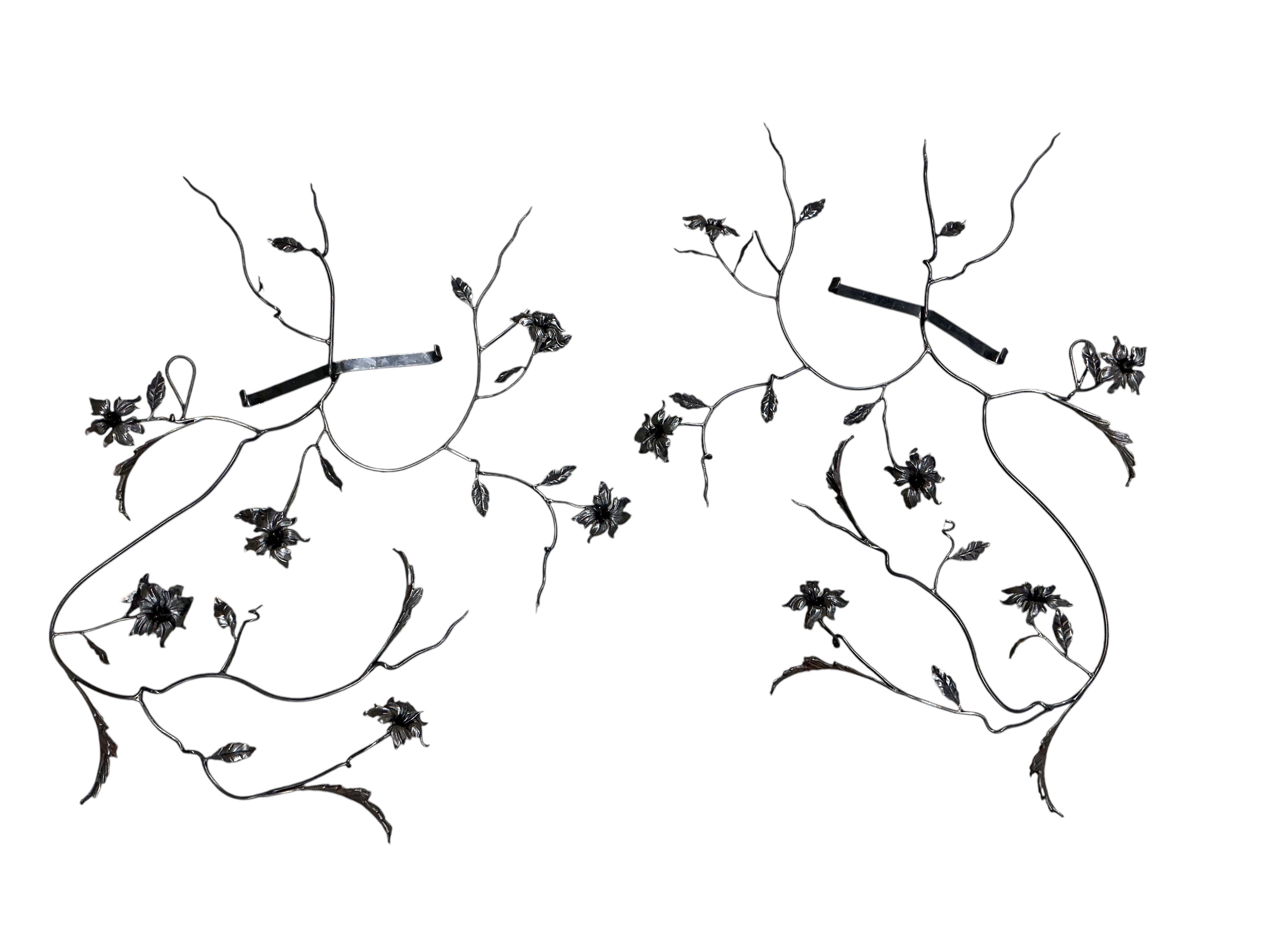A pair of Contemporary floral wrought iron wall sculptures by Paul Wells, Anvil Ironworks, Brighton